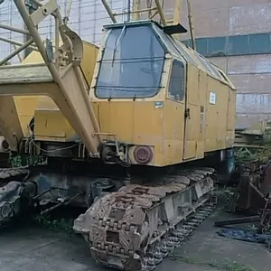 Услуги крана МКГ25бр в Харькове,  аренда кранов РДК 250 по Харькову.
