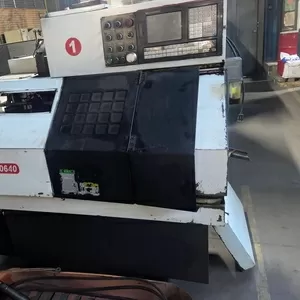 Продам б/у токарный станок с ЧПУ CJK0640 