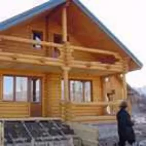 Деревянный дом из бревна оцилиндрованнго